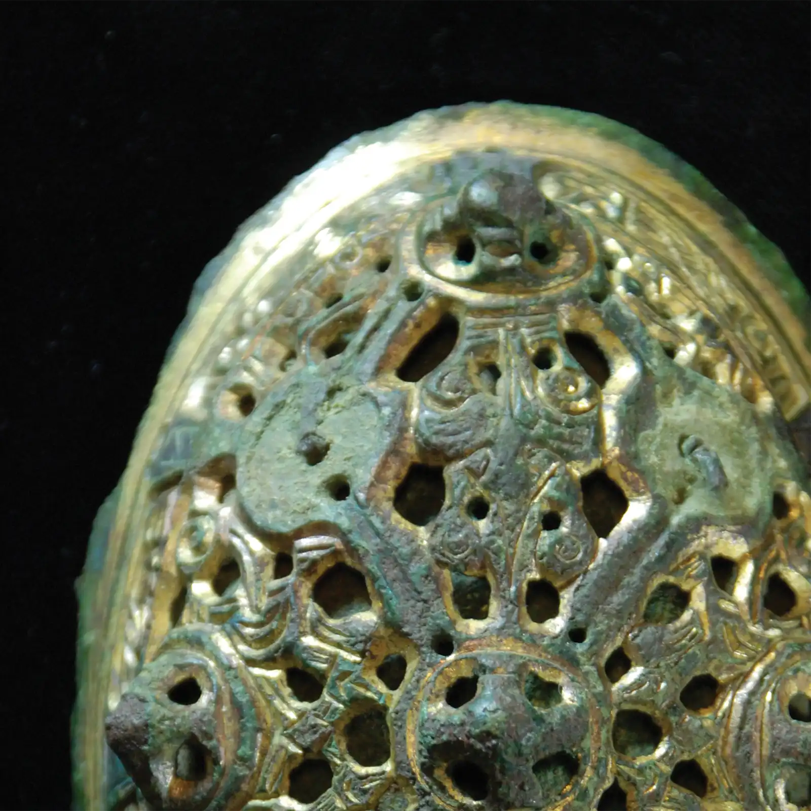 An early medieval gilded copper-alloy oval brooch, from about AD 900–1000.