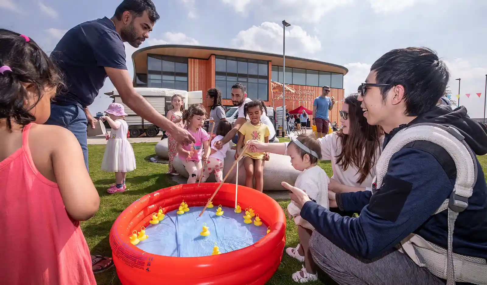 Children playing hook-a-duck
