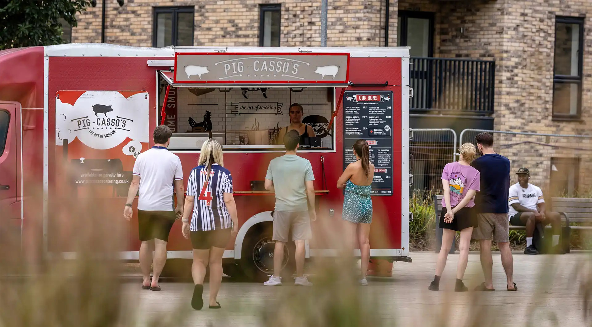 People queuing at a food van at Wintringham