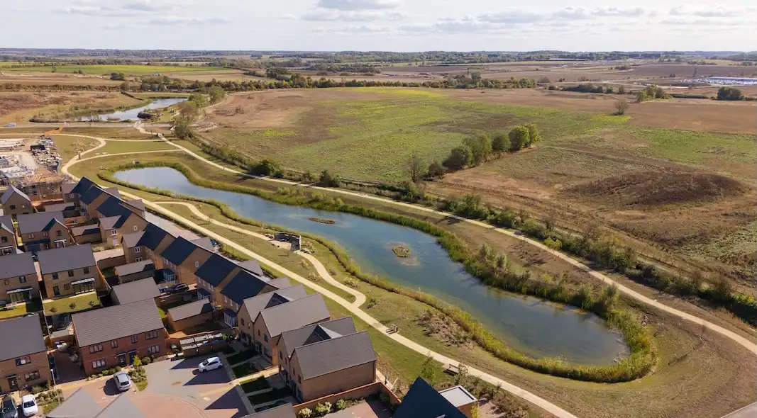 Aerial view of Wintringham Lakes with houses